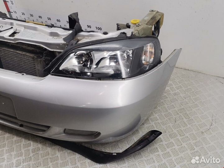 Бампер (ноускат) для Opel Astra G R0B2F11K1V1