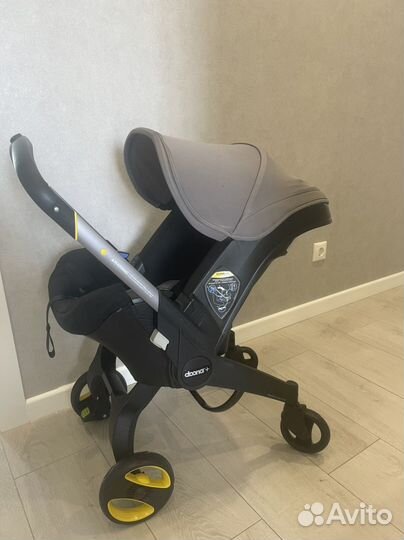 Коляска автолюлька doona