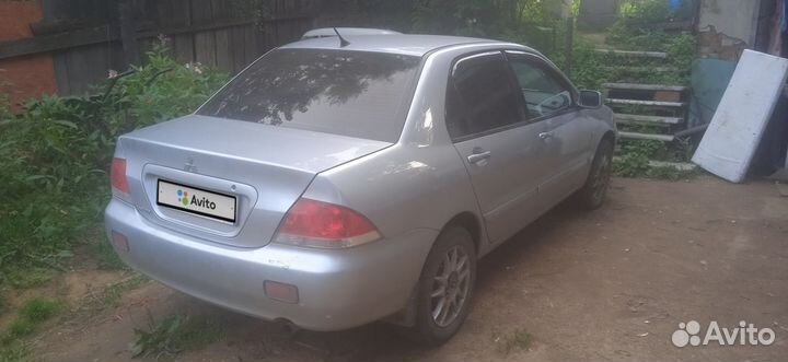 Mitsubishi Lancer 1.6 МТ, 2009, 122 000 км