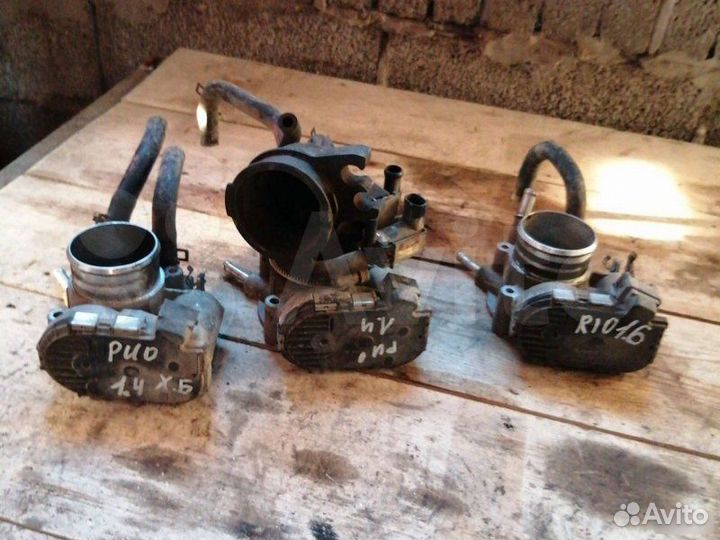 Дросельная заслонка Kia Rio 1.4