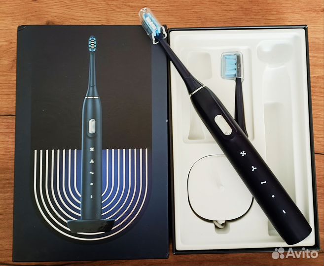Электрическая зубная щетка