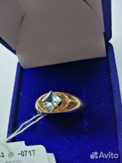 Золотое кольцо 375 пробы с топазом (новое) р 17