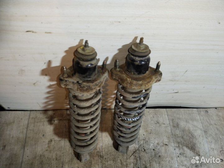 Стойка подвески задняя Mitsubishi Lancer 9