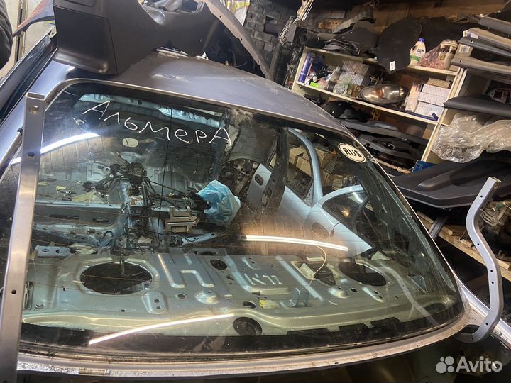 Стекло заднее Nissan Almera N16