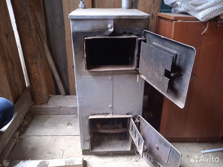 Котёл твердотопливный с чугуными батареями