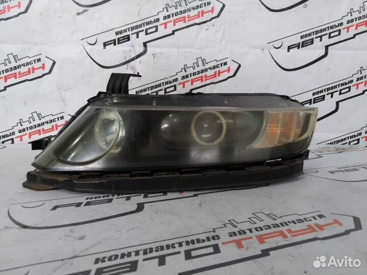 Фара honda odyssey RB1 RB2 10022497 xenon левая пр