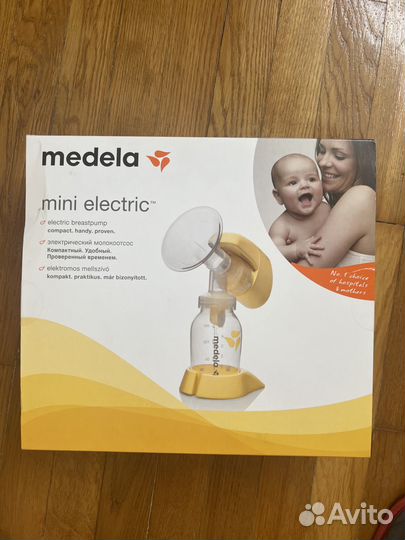 Молокоотсос medela электрический