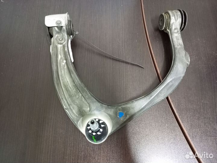 Рычаг верхний левый Cadillac Escalade 2021