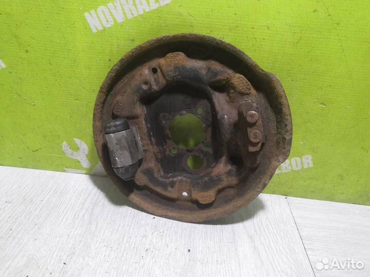 Щит опорный задний правый Пежо 206