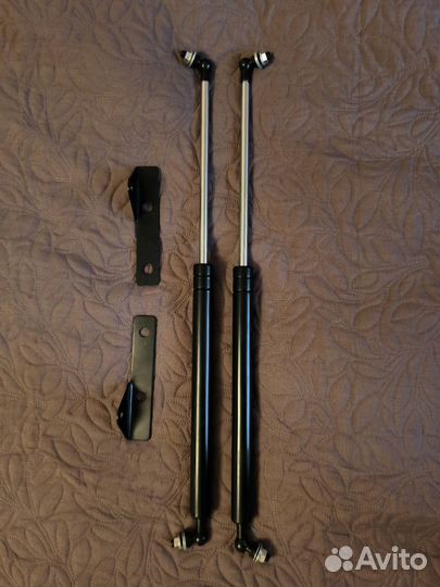 Газовые упоры капота lancer x