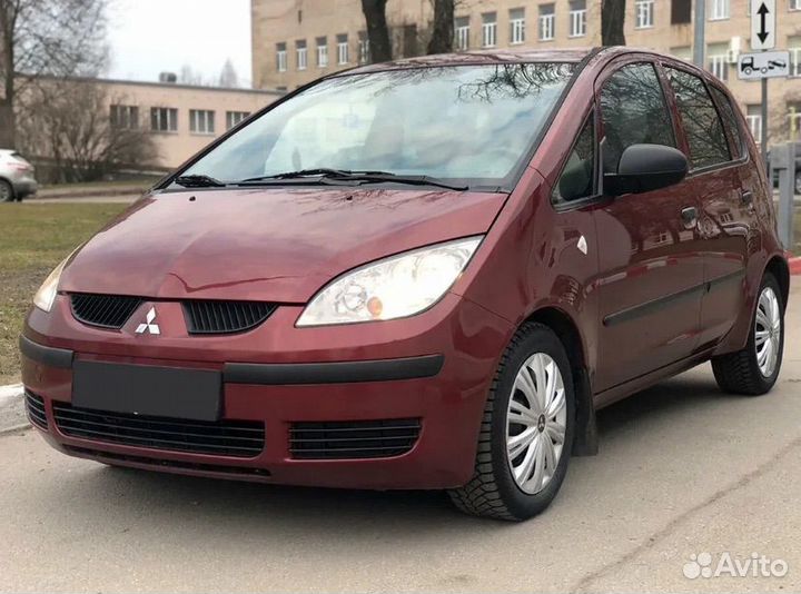 Пружина передняя Mitsubishi Colt