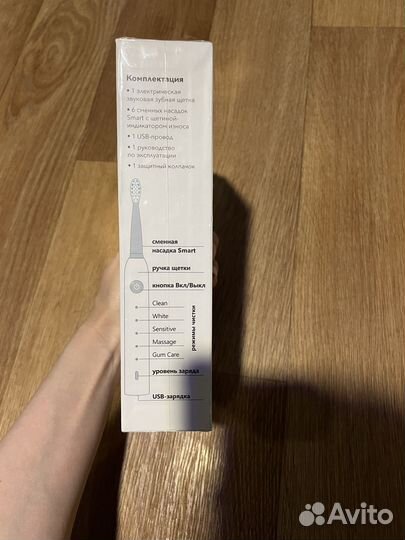 Электрическая зубная щетка