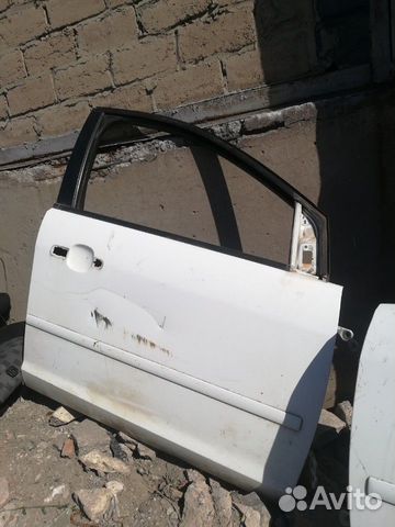 Дверь передняя левая Toyota Corolla E150