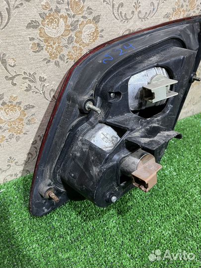 Фонарь левый в крышку багажника Nissan Maxima A33