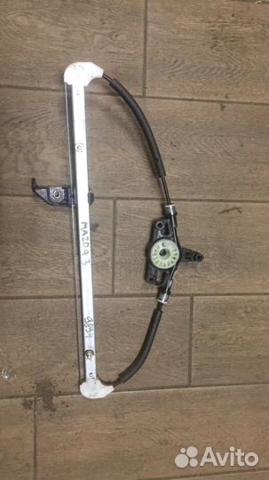 Стеклоподъемник электрический задний левый Mazda 3