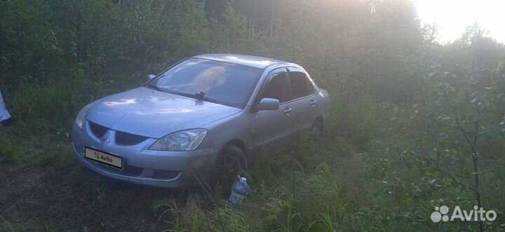 Mitsubishi Lancer 1.6 МТ, 2009, 122 000 км