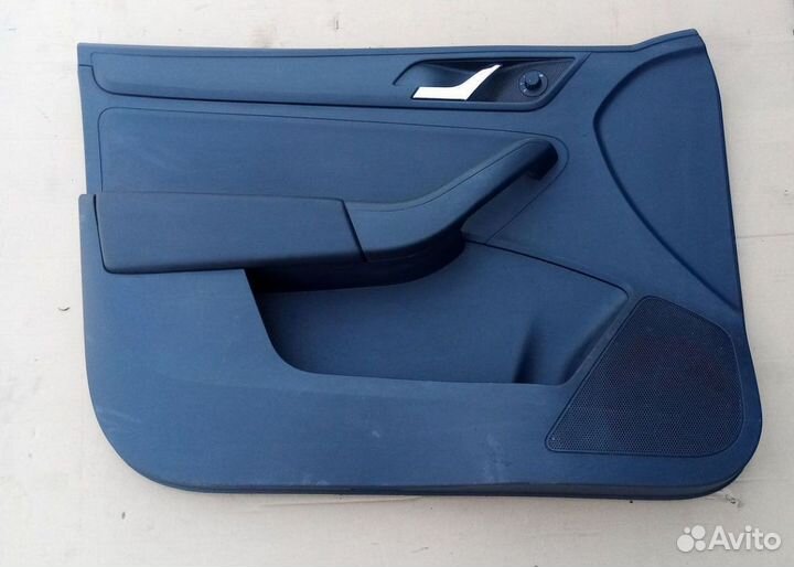 Обшивка двери передней левой Skoda Rapid