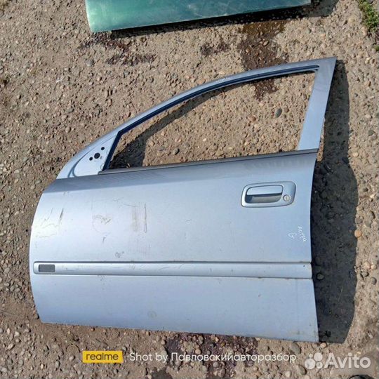 Дверь Opel Astra G