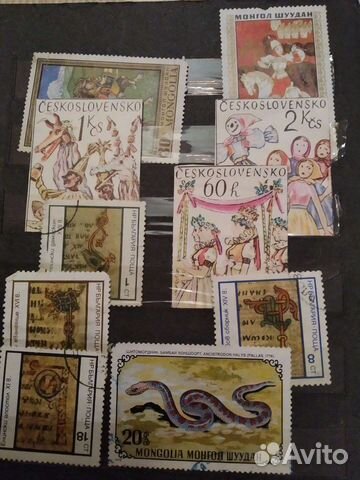 Почтовые марки в альбоме