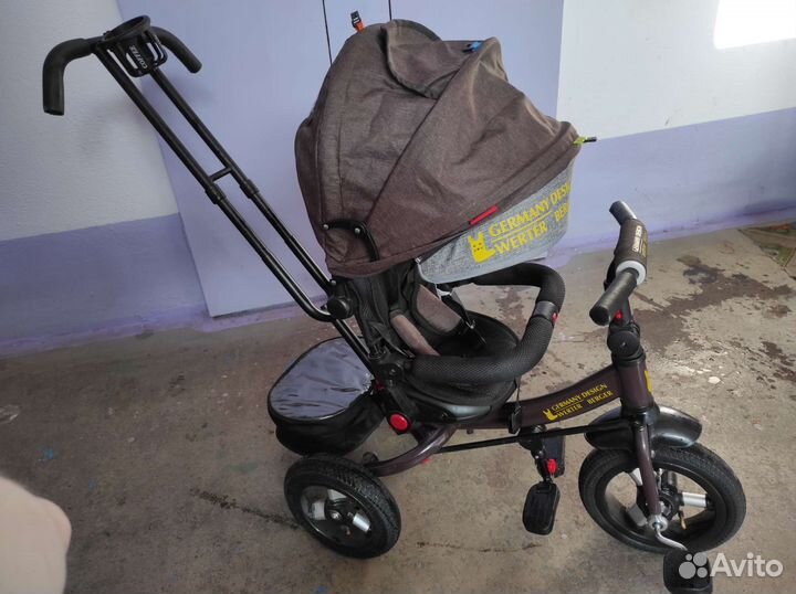 Трехколесный велосипед с ручкой