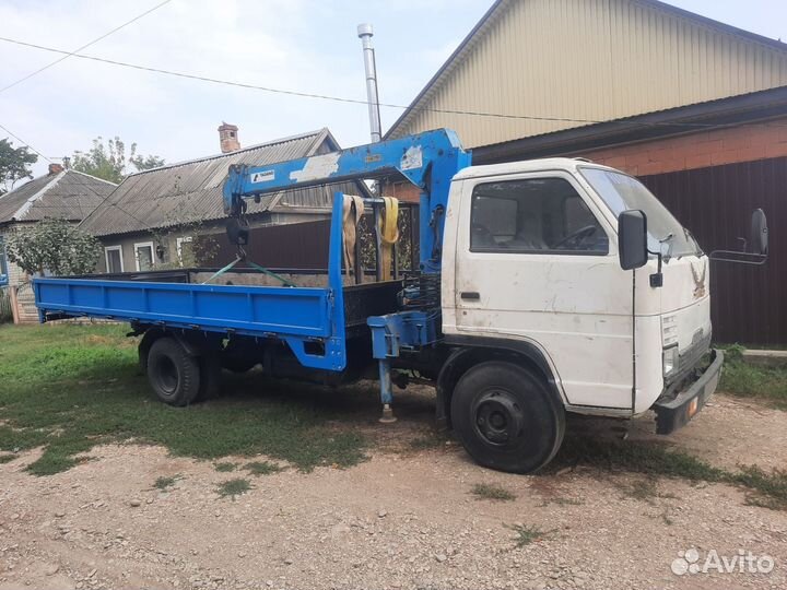 Бортовой грузовик Mazda Titan с КМУ Tadano, 1987