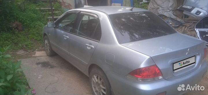 Mitsubishi Lancer 1.6 МТ, 2009, 122 000 км