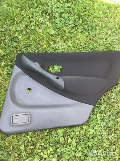 Обшивка задней двери Fiat Albea