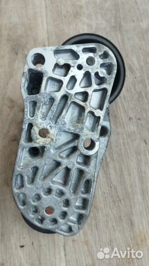 Натяжитель ремня грм Opel Omega