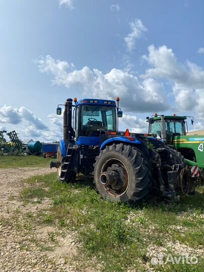 Трактор new holland Т9040