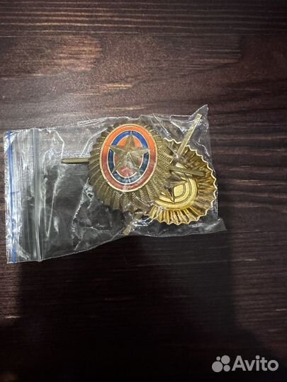 Кокарда мчс нового образца