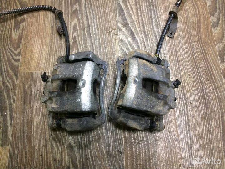 Суппорт тормозной передний Rio 3, Hyundai Solaris