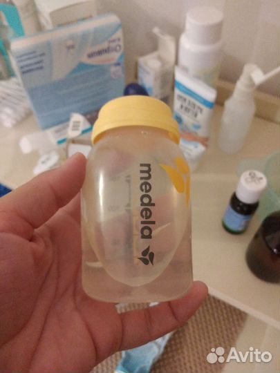 Молокоотсос medela электрический