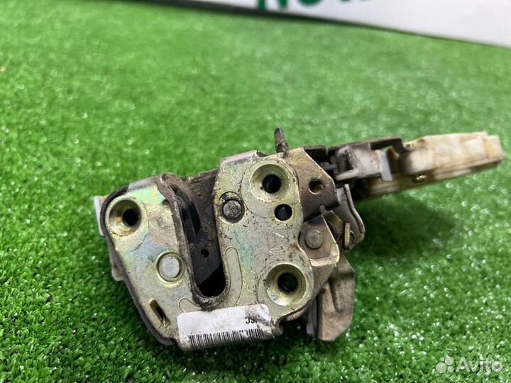 Замок боковой двери задний левый Nissan Almera N16