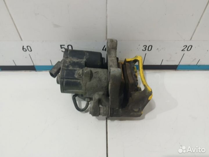 Суппорт тормозной задний правый Passat B6