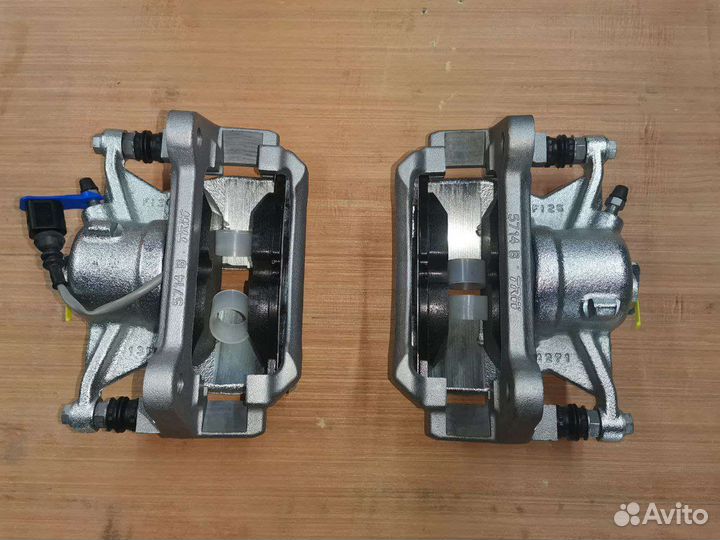 Новый оригинальный передний тормозной суппорт