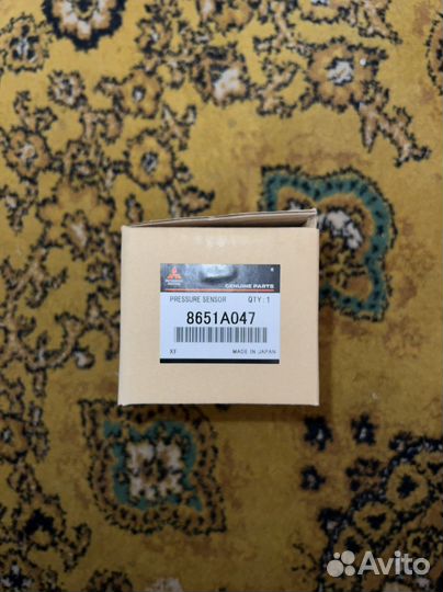 Датчик положения кузова задний Mitsubishi 8651A047