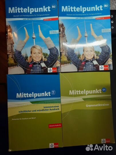 Учебники немецкий В2 Mittelpunkt и EM Hueber синие