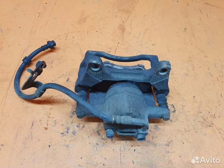 Суппорт тормозной передний правый Dodge Journey