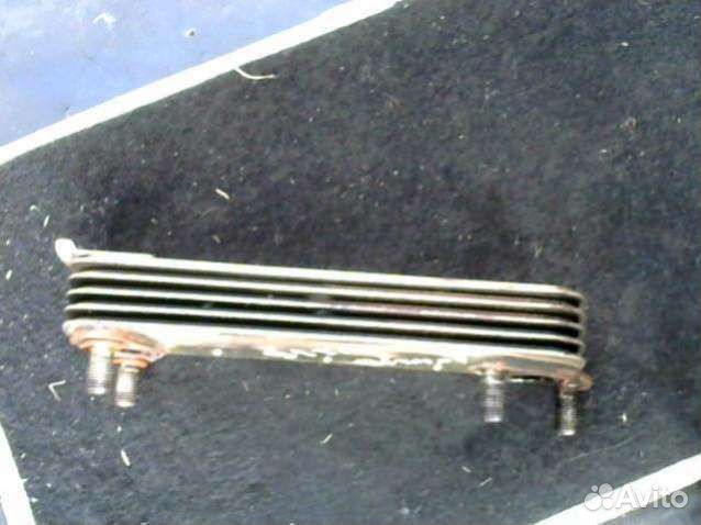 Теплообменник масляного фильтра Kia Carnival 1