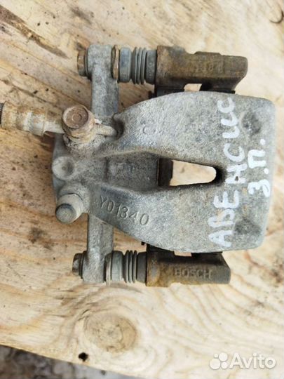 Суппорт тормозной задний Тойота Авенсис 250