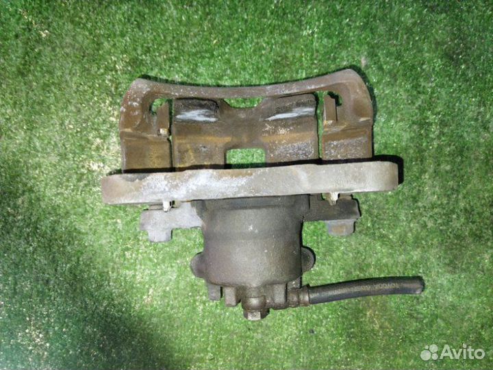 Суппорт тормозной передний левый Mitsubishi Lancer