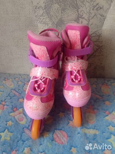 Роликовые коньки