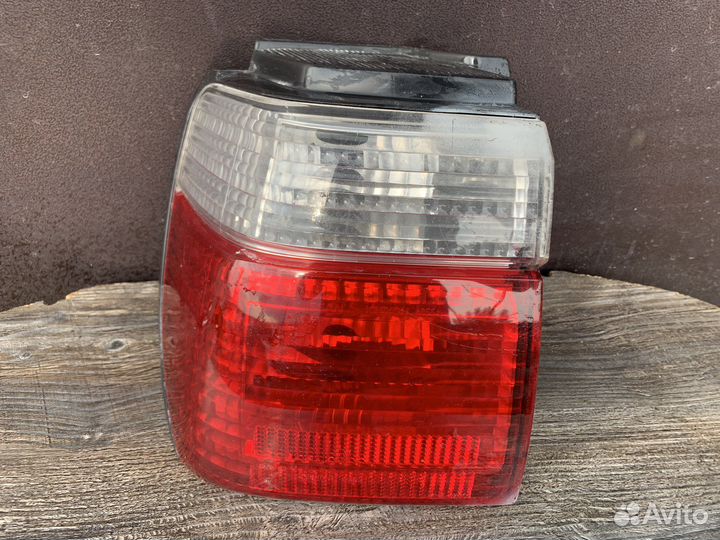 Фонарь задний левый Nissan Stagea 34 рест (дефект)