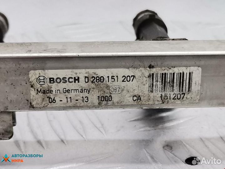 Форсунка Opel Corsa D 2007 55562250