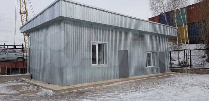 Открытая площадка,1000 м² с помещениями и краном