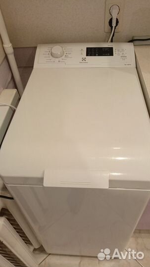 Стиральная машина с вертикальной загрузкой