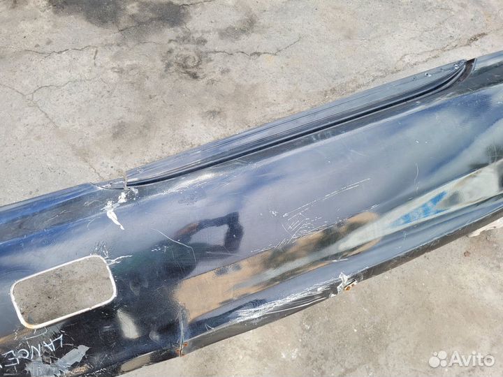 Бампер задний на Mitsubishi Lancer 9