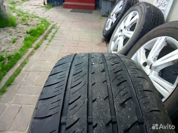 Литые диски Субару с шинами