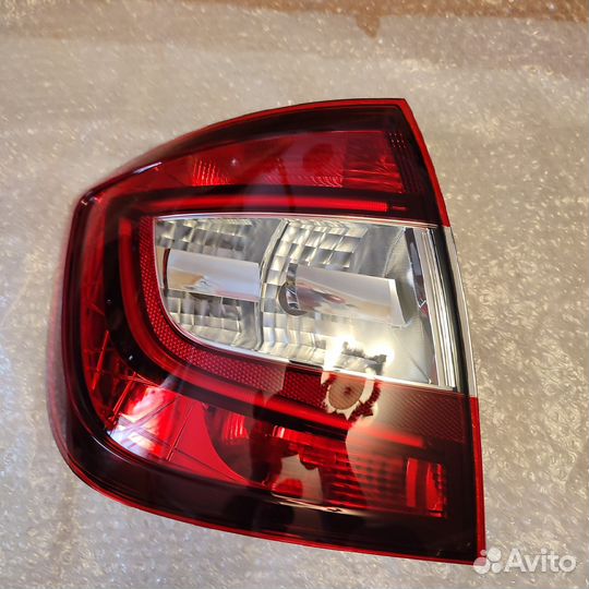 Фонаpь задний левый Skoda Rapid