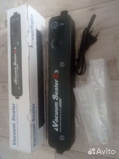 Вакуумный упаковщик новый